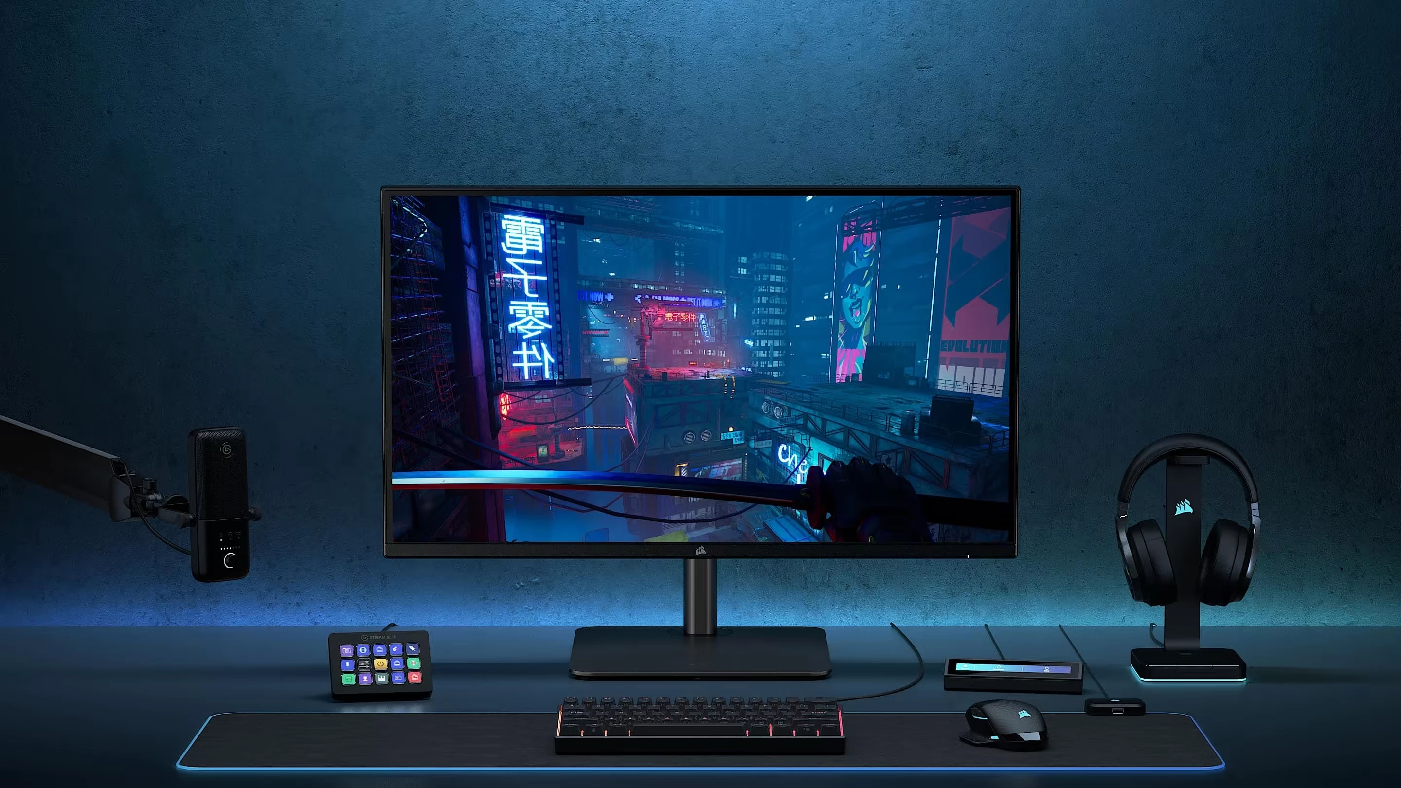 Corsair gaming monitor setup met toetsenbord, muis, headset en muismat